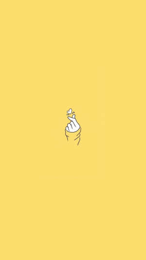 Pastel Yellow Aesthetic Finger Heart Wallpaper