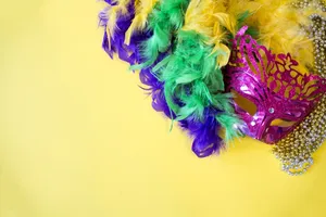 Pastel Yellow Mardi Gras Mask Wallpaper