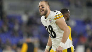 Pat Freiermuth Smiling During Game Wallpaper