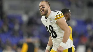 Pat Freiermuth Smiling During Game Wallpaper