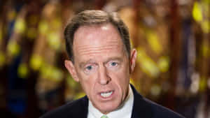 Pat Toomey Looking Down Wallpaper