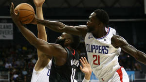 Patrick Beverly Blocking James Harden Wallpaper