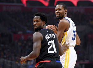 Patrick Beverly Defending Warriors Kevin Durant Wallpaper