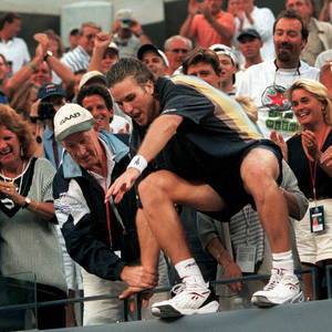 Patrick Rafter Relaxing On A Ledge Wallpaper