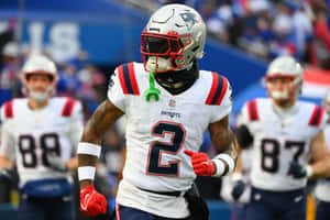 Patriots Player Jalen Mills On Field Wallpaper