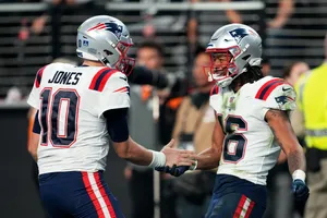 Patriots Players Celebratingon Field Wallpaper