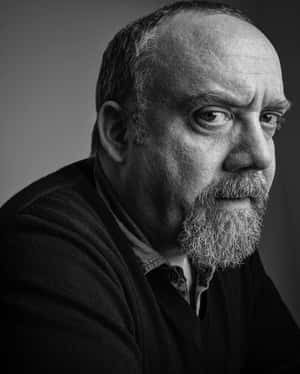 Paul Giamatti In A Black Suit And Blue Tie. Wallpaper
