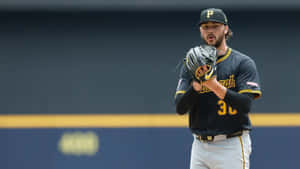 Paul Skenes Pitching Focus Wallpaper