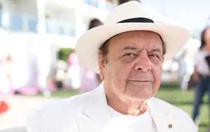 Paul Sorvino In His Iconic Performance As Paulie Cicero In Goodfellas Wallpaper