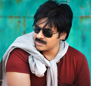 Pawan Kalyan Captivating The Audience In Red Outfit Wallpaper