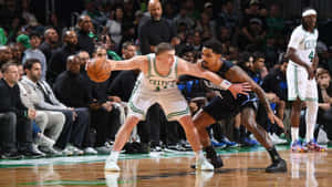 Payton Pritchard Basketball Defense Wallpaper