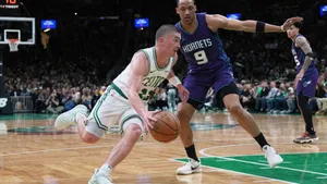 Payton Pritchard Driving To Basket Wallpaper