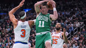 Payton Pritchard Shooting Over Defenders Wallpaper