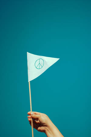 Peace Symbol On White Flag Wallpaper