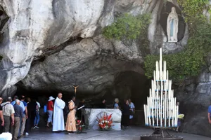 Peaceful Lourdes Sanctuary In Twilight Wallpaper
