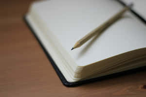 Pencil_on_ Open_ Notebook Wallpaper