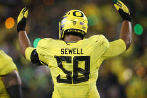 Penei Sewell Oregon Ducks Celebration Wallpaper