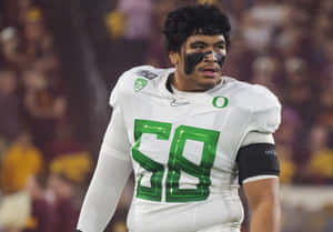 Penei Sewell Oregon Football Uniform Wallpaper