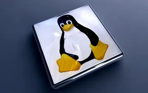 Penguin Tux: The Linux Mascot In Its Natural Habitat Wallpaper