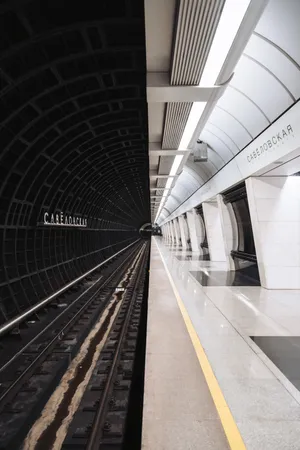 People Commuting On The Metro In A City Wallpaper