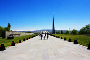 People Walking At Armenian Genocide Memorial Wallpaper