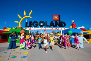 People Walking At Legoland California Wallpaper