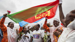 People Waving Eritrea Flag Wallpaper