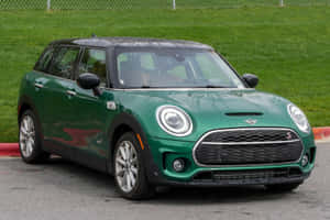 Perfectly Captured Mini Cooper S Clubman All4 In Action Wallpaper