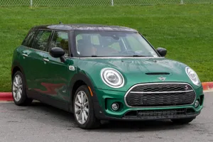 Perfectly Captured Mini Cooper S Clubman All4 In Action Wallpaper