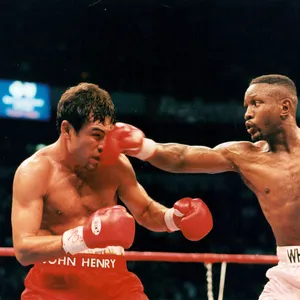 Pernell Whitaker Connecting Right Punch Wallpaper