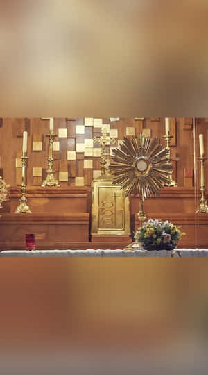 Person Holding A Sacrament Chalice Wallpaper