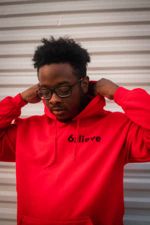 Person Wearing Vibrant Red Hoodie Wallpaper