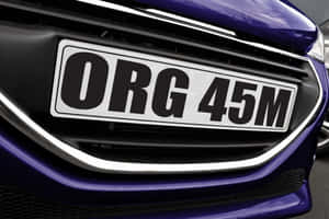 Personalized Vehicle License Plate On The Rear Of A Car Wallpaper