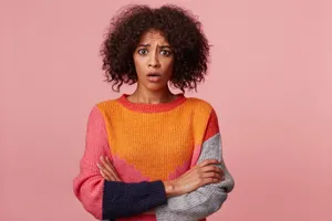 Perturbed Curly-haired Woman Wallpaper