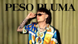 Peso Pluma Aesthetic Man Posing Wallpaper