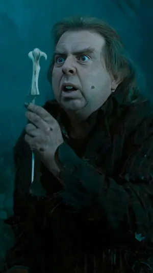 Peter Pettigrew Holding Wand Wallpaper