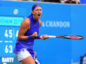 Petra Kvitova In Intense Tennis Match Wallpaper