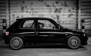 Peugeot106 Black Side Profile Wallpaper