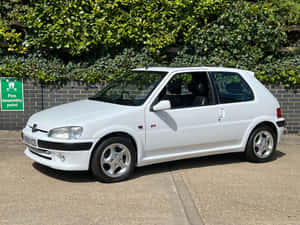 Peugeot106 G T I White Parked Wallpaper