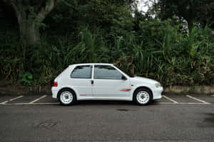 Peugeot106 Rallye Parked Wallpaper