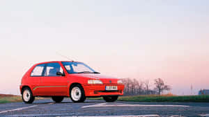 Peugeot106 Red Hatchback Outdoor Wallpaper