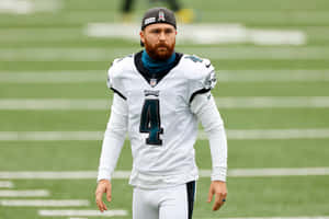 Philadelphia Eagles Player Number4 Walkingon Field Wallpaper