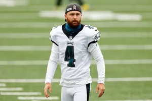 Philadelphia Eagles Player Number4 Walkingon Field Wallpaper