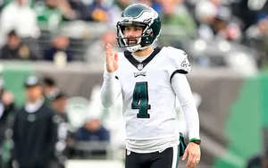 Philadelphia Eagles Player Signaling On Field.jpg Wallpaper