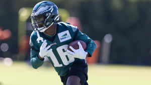 Philadelphia Eagles Player Training With Football Wallpaper