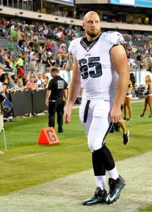 Philadelphia Eagles Player Walkingon Field Wallpaper