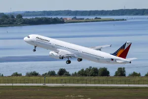 Philippine Airlines Plane Taking Off With Lake View Wallpaper