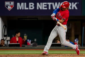 Phillies Player Swinging Bat Action Shot Wallpaper