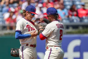 Phillies Players Celebrating On Field Wallpaper