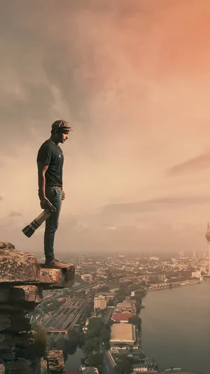 Photographer At Heights Wallpaper